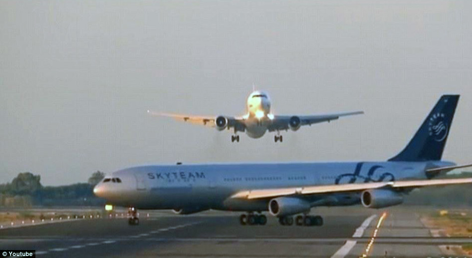 上海热线新闻频道-- 西班牙第二大机场两飞机险
