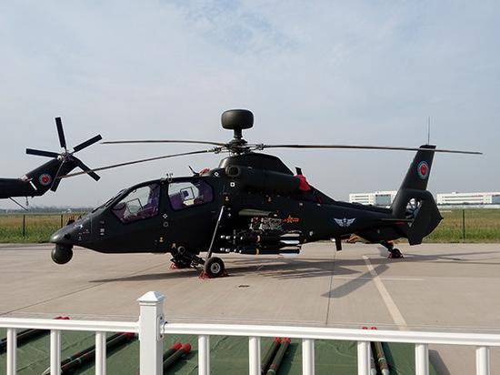 近期在天津直博会上公开亮相的直-19雷达型武装直升机列装后将让我军直升机部队的编成更加合理