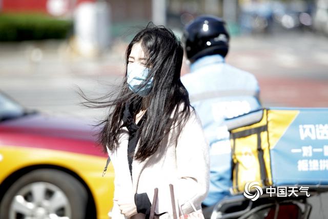北京今天刮大风有几级 市民"顶风"出行——上海热线新